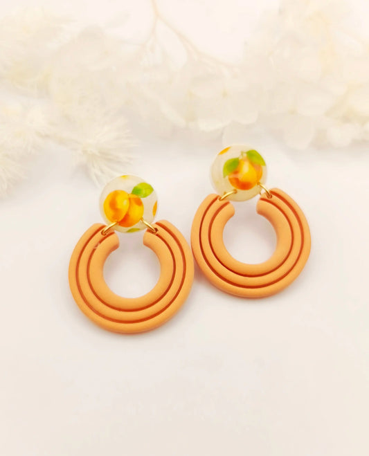 Bijoux avec couleur et motifs abricot